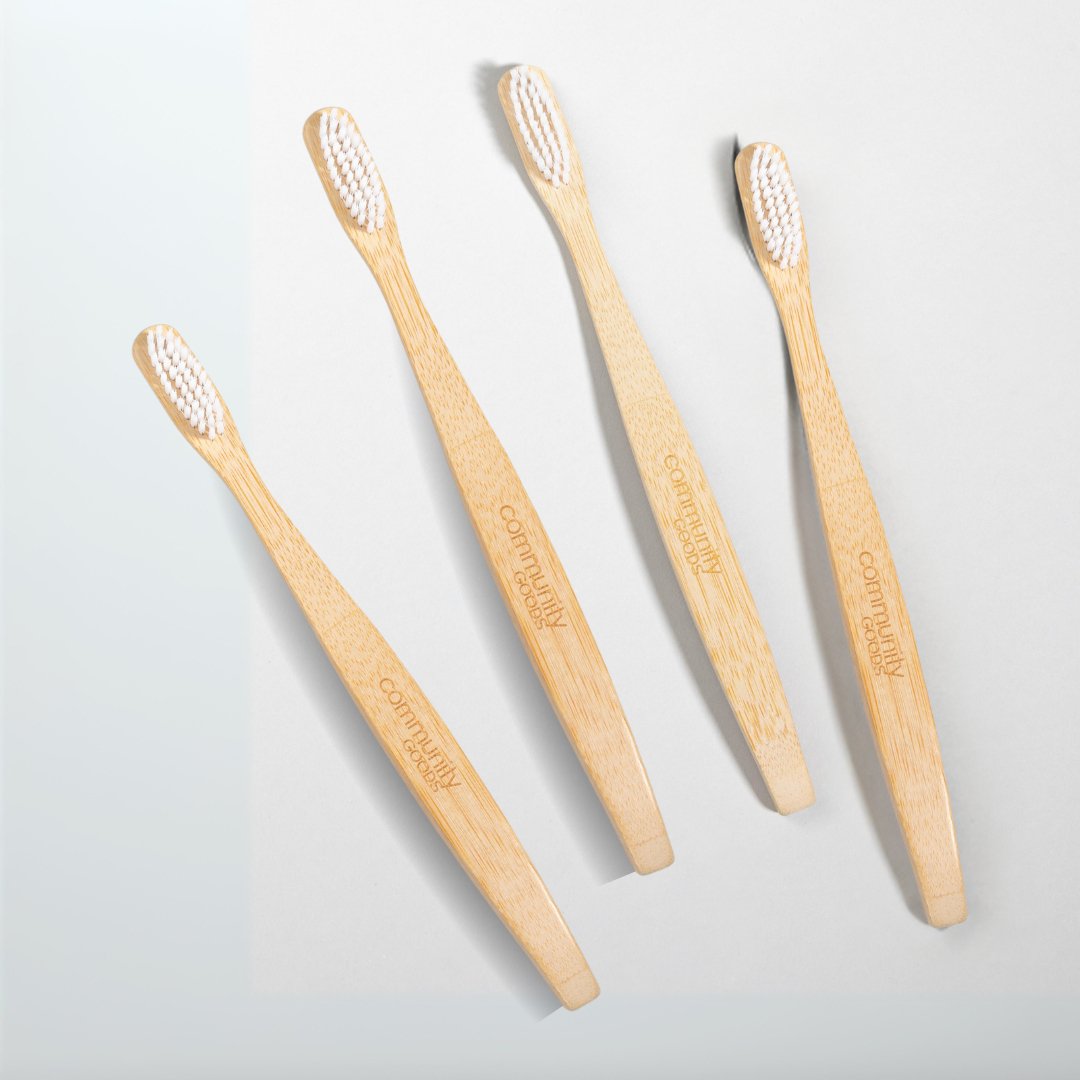 A 4 Pack of Natural Bamboo Toothbrushes by Community Goods